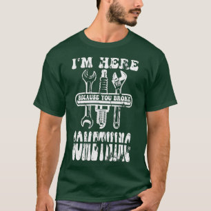 Camiseta Estou aqui porque você quebrou alguma coisa.