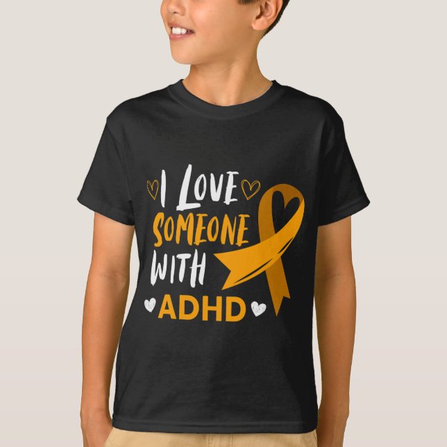 Camiseta Eu Amo Alguém Com Faixa De Consciência Do Adhd Saú (Frente)