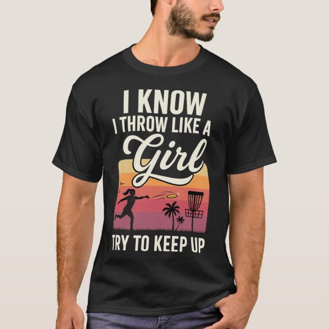 Camiseta Eu Arremesso Como Uma Garota Disc Golf Tente Acomp (Frente)
