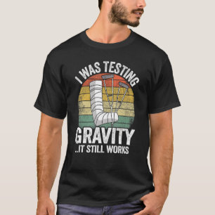 Camiseta Eu Estava Testando Gravidade Que Ainda Funciona Co