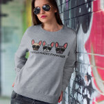 Camiseta Eu Falo "Fluent Frenchie Funny French Bulldog Cote<br><div class="desc">Esta camisola francesa engraçada faz o presente perfeito para amantes frenchidos. A design apresenta os touros franceses do estilo cartoon vestindo óculos de sol de aviador com o texto "I Speak Fluent Frenchie" embaixo.</div>