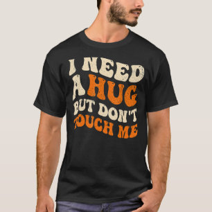 Camiseta Eu preciso de um abraço, mas não me toques nos apr