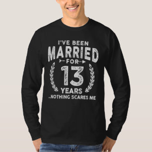Camiseta Eu sou casado há 13 anos, nada me assusta.
