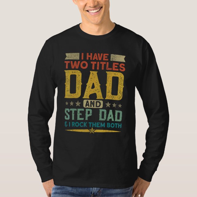 Camiseta Eu Tenho Dois Títulos Do Pai Stepdad E Eu Os Rodo  (Frente)