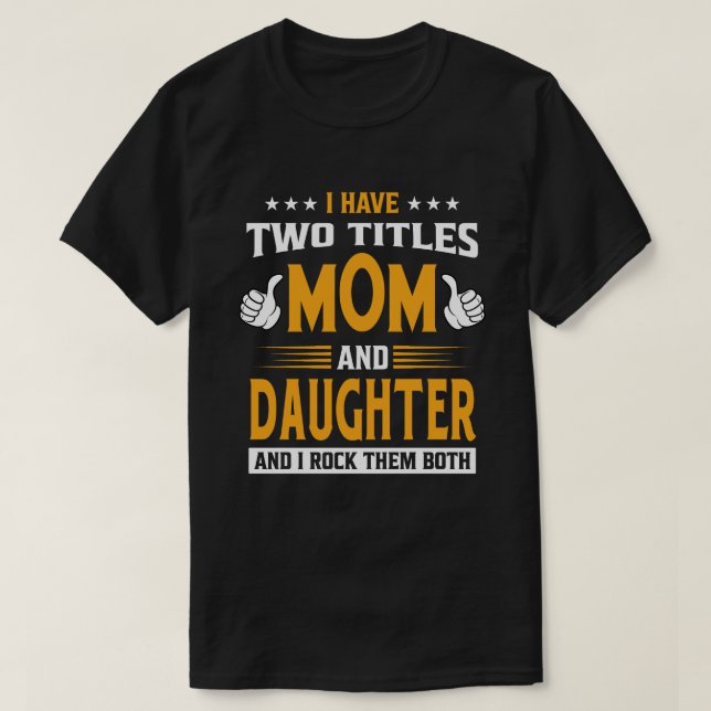 Camiseta Eu Tenho Dois Títulos Mãe E FILHA E Eu Os Rodo (Frente do Design)