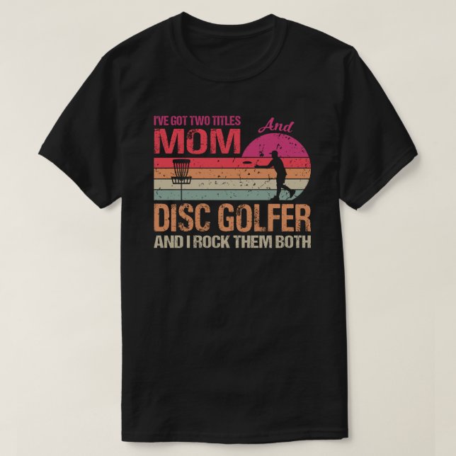Camiseta Eu tenho dois títulos: Mãe e Golfer de Disco e Eu  (Frente do Design)