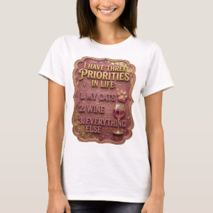 CAMISETA EU TENHO TRÊS PRIORIDADES NA VIDA 1 MEUS GATOS 2 V