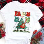 Camiseta Fa La La Christmas Tree Guitar Retro<br><div class="desc">Entre no entalhe festivo com esta design de árvore de Natal "Fa La" divertida e peculiar. Apresentando uma árvore de Natal retrógrada balançando em um violão, esta camisa é perfeita para qualquer um que adora combinar alegria de férias com um toque de talento de safra. Esteja você participando de uma...</div>