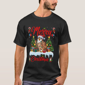 Camiseta Falcon Bird Xmas Tree Lighting Santa Hat Falcon Ch