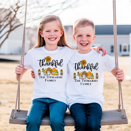 Camiseta Família de gnomos de girassol.