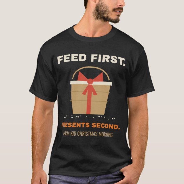Camiseta Feed First Apresenta Second, Natal de Criança da F (Frente)