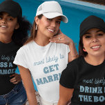 Camiseta Festa de solteira Mais Provável Para Casar<br><div class="desc">Traga um toque de antecipação divertida para as festividades da solteira com esta charmosa e personalizável design de camiseta! Apresentando a frase perfeitamente adequada "mais propensa a CASAR-SE" em letras azuis empoeiradas contra um fundo branco nítido, esta design é doce e insensata. É uma escolha ideal para a noiva ser...</div>