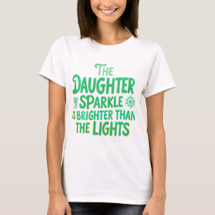 Camiseta Filha de Natal Espumante Mais Brilhante Que Luzes