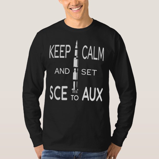 Camiseta Fique Calmo E Defina Sce Para Aux Com Saturno Para (Frente)