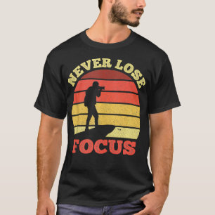 Camiseta Fotografia do Cameraman sobre nunca focalizar o Pe
