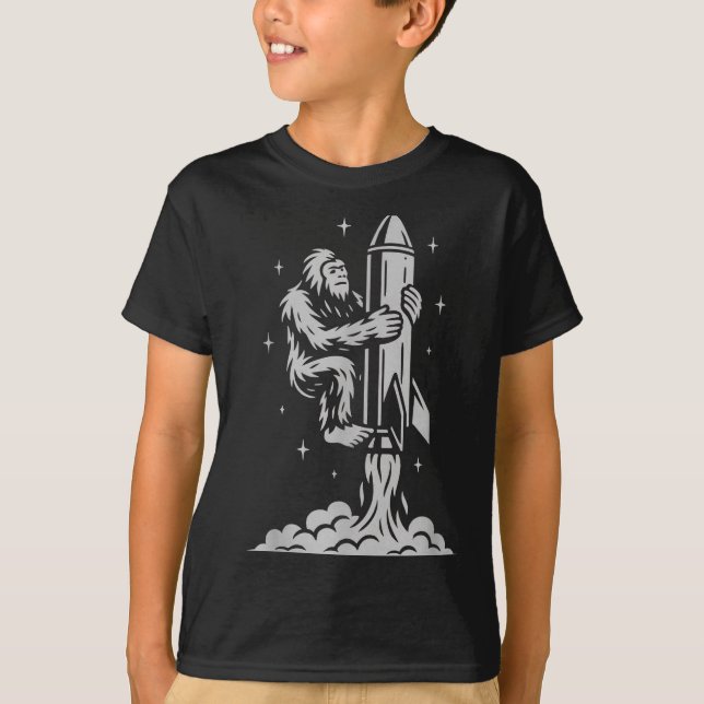 Camiseta Funny Bigfoot Flying Into Space With Stars And Cos (Frente)