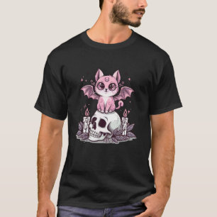 Camiseta Gato alado de morcego rosa fofo sentado em caveira