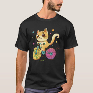 Camiseta Gato bonito andando de bicicleta com bolas de pare