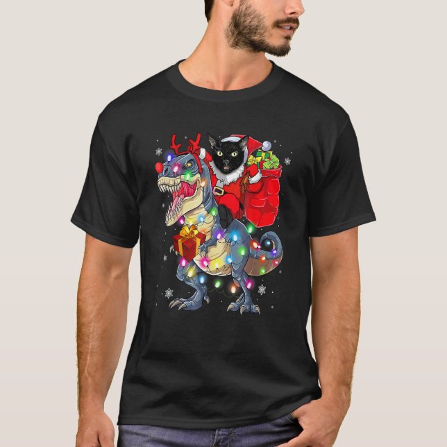 Camiseta Gato Montado Em Um Dinosaur Rex Natal (Frente)