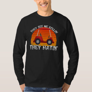 Camiseta Golfe Engraçado Eles Me Veem Rolando Carro De Golf