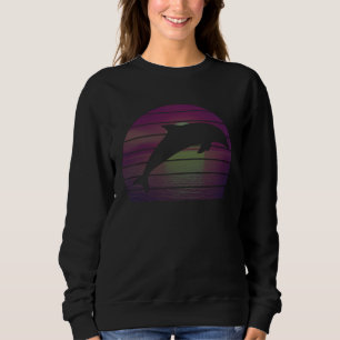Camiseta Golfinho saltando pôr do sol oceano céu roxo retrô