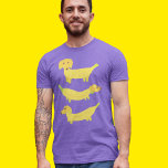 Camiseta Gráfico de Cães de Banana Amarelo-Bonitos<br><div class="desc">Este gráfico divertido apresenta ilustrações de três cães feitos de bananas amarelas,  ou de bananas-cão.</div>