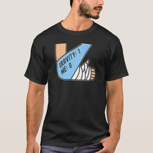 Camiseta Gravidade 1 Eu 0 Fratura no Braço (Frente)