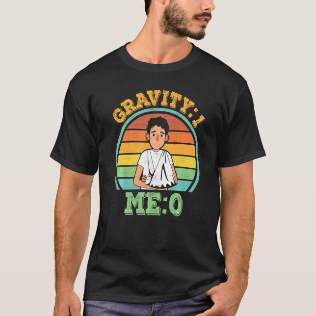 Camiseta Gravidade 1 Me 0 Fratura de Braço 1 (Frente)