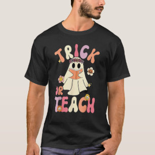 Camiseta Groovy Halloween Truque ou Ensine Floral Retro Fan