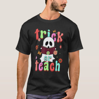 Camiseta Groovy Halloween Truque ou Ensine Floral Retro Fan