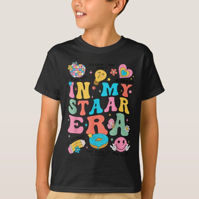 Camiseta Groovy In My Starr Era Testing Day Teacher Kids Mo (Frente)