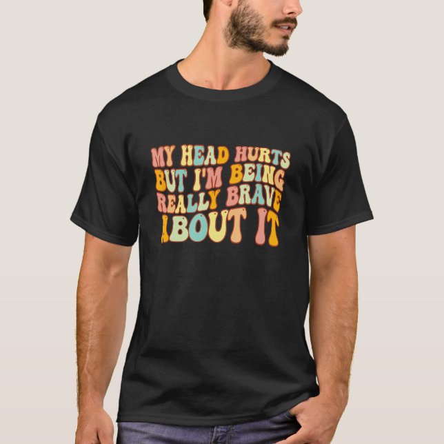 Camiseta Groovy Minha Cabeça Dói Mas Estou Sendo Muito Cora (Frente)
