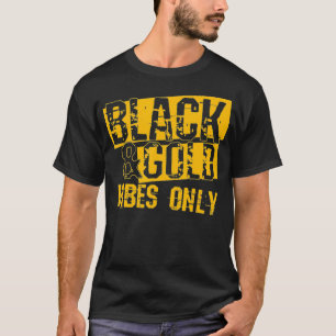Camiseta Grupo Dourado do Dia de Jogo Negro para Pegada do