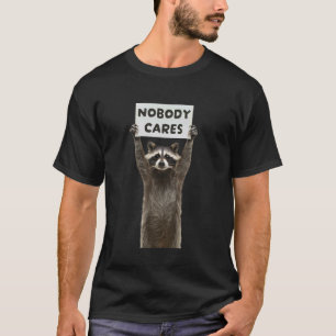 Camiseta Guaxinim engraçado segurando um Cartaz - Ninguém s