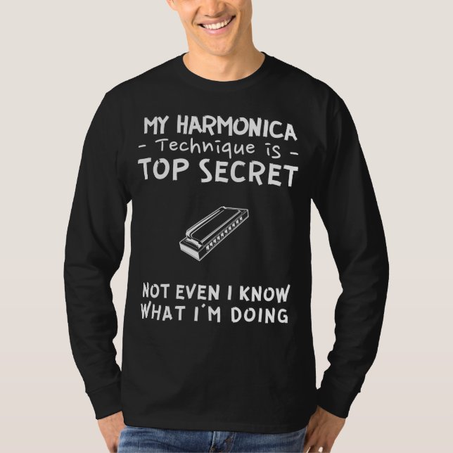 Camiseta Harmonize o mistério de minhas habilidades de harm (Frente)