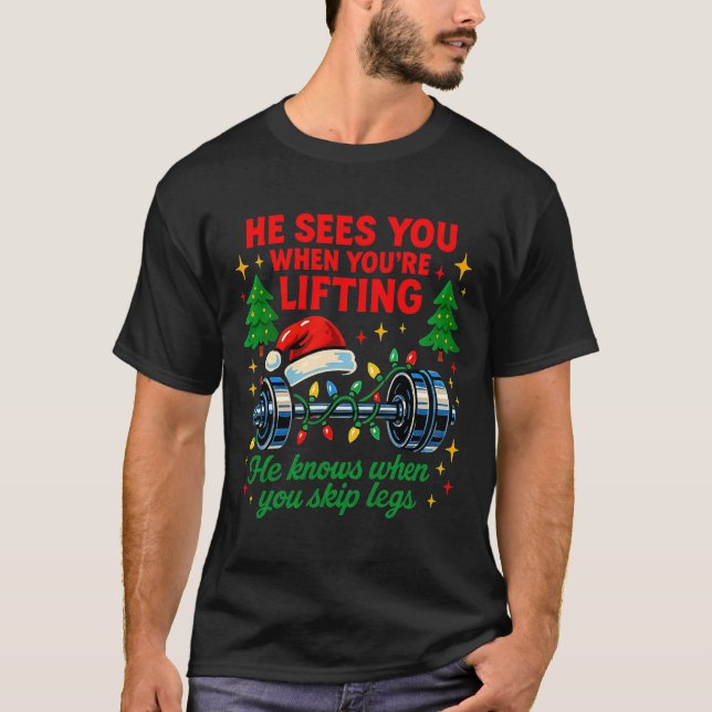 Camiseta He Sees You Lifting Funny Skip Legs Christmas Tee  (Frente)