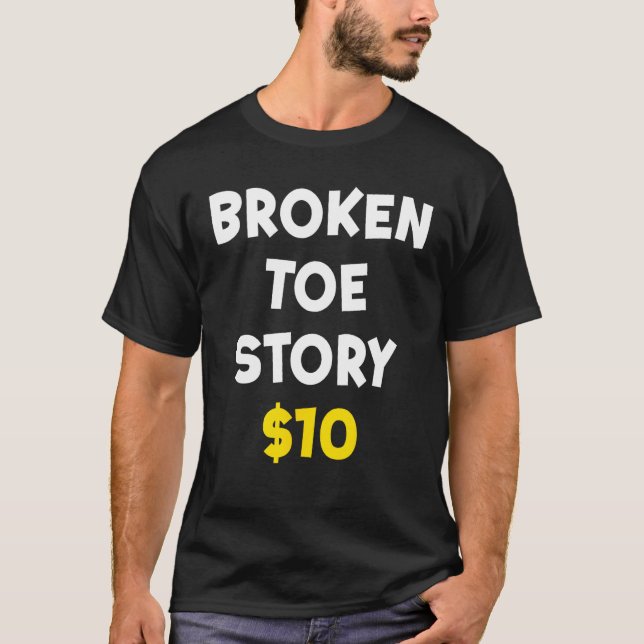 Camiseta História de Toe Quebrada $10 Ferimento de Osso Eng (Frente)