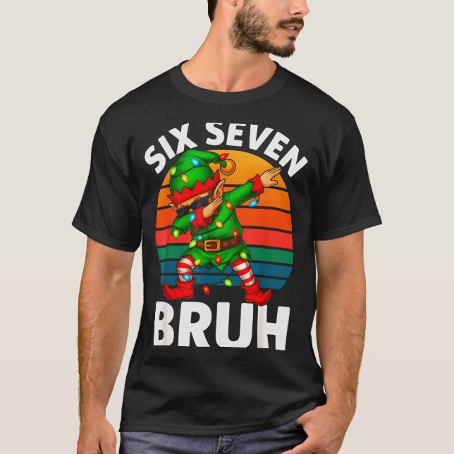 Camiseta Hugvyn Seis Sete 6 7 Meme Dabbing Elfo Alegre Nata (Frente)