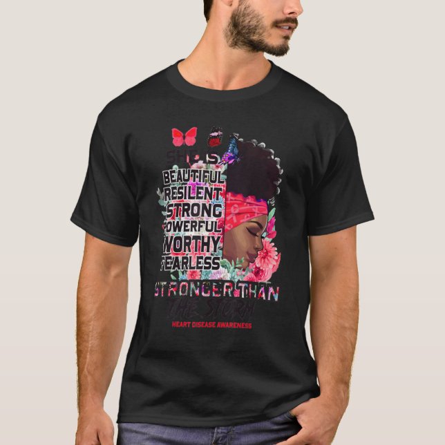 Camiseta I Am The Storm Black Woman Afro Heart Disease Awar (Frente)