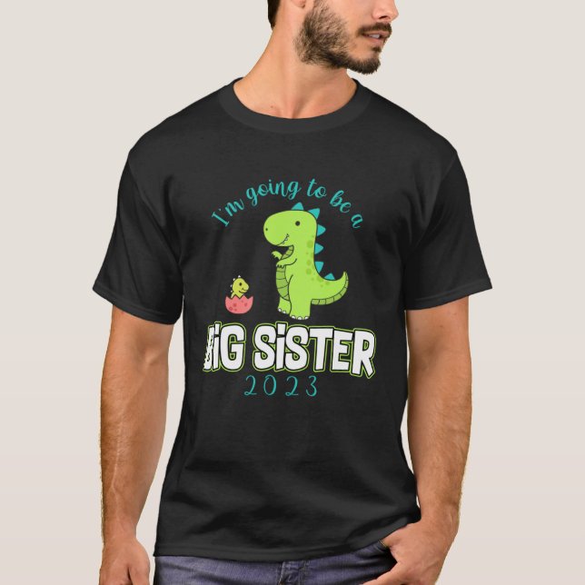 Camiseta I m going To Be A Big Sister 2023 Dinosaur Promote (Frente)