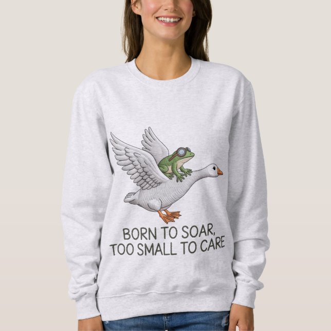 Camiseta Ilustração de Ganso Voador com Sapo Engraçado Nasc (Frente)