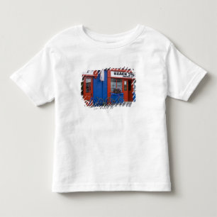 Camiseta Infantil Irlanda, Strandhill. Fachadas de lojas com bicicle