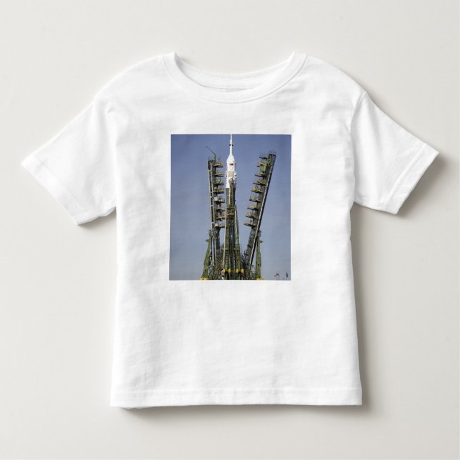 Camiseta Infantil O foguete Soyuz é erguido na posição 4 (Frente)