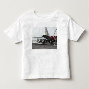 Camiseta Infantil Um F/A-18C Hornet é lançado da cabina de pilotagem