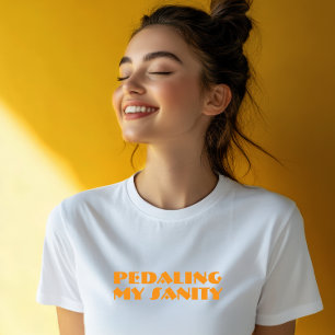 Camiseta Ironia de Garota de Bike laranja