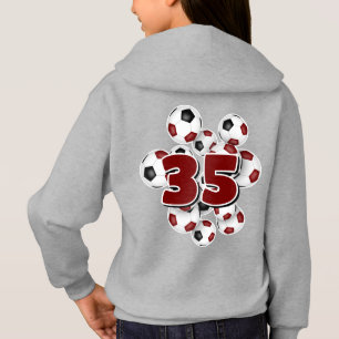 Camiseta jersey número no grupo de bolas de futebol maron