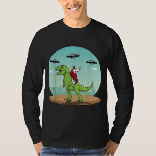Camiseta Jesus Dirigindo Um Dinossauro Engraçado OVNI Alien