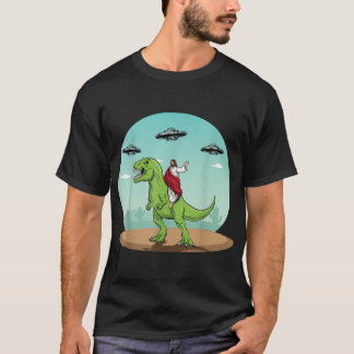 Camiseta Jesus Dirigindo Um Dinossauro Engraçado OVNI Alien