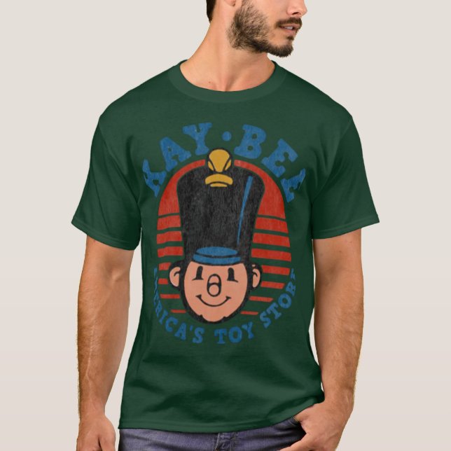 Camiseta Kay Bee - Loja de Brinquedos da América (Frente)