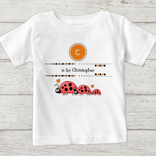 Camiseta Ladybugs adiciona nome preto e laranja